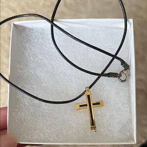 Gold Cross Pendant on Black Leather Necklace